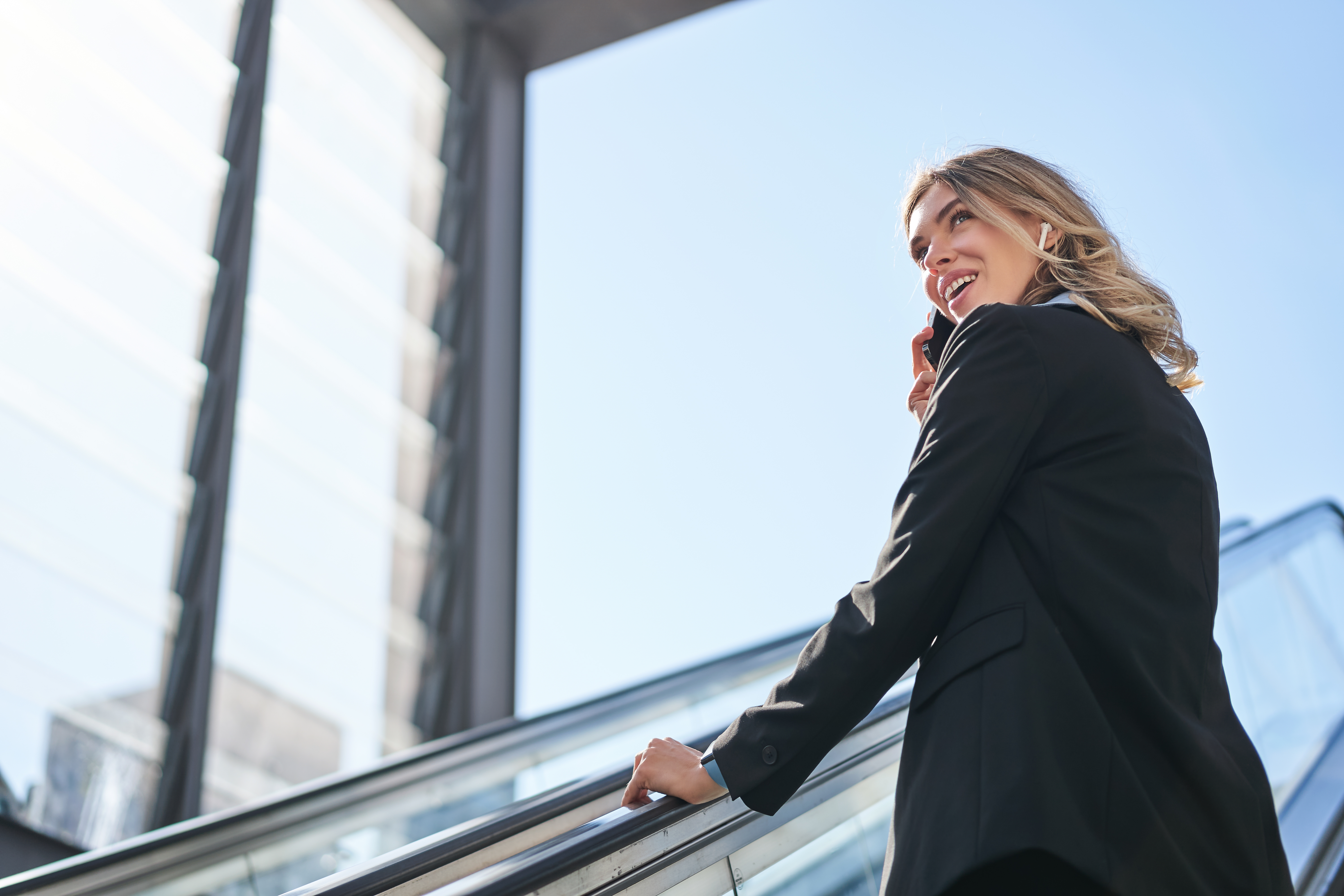 Confident person moving forward after achieving their financial goals